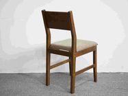 Krzesło do jadalni z litego drewna orzechowego z pochyloną poduszką